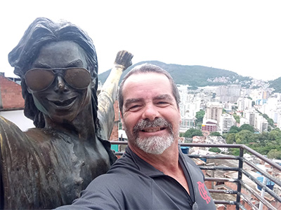 Tour Guide Gus at the statue of Michael Jackson in Rio de Janeiro.